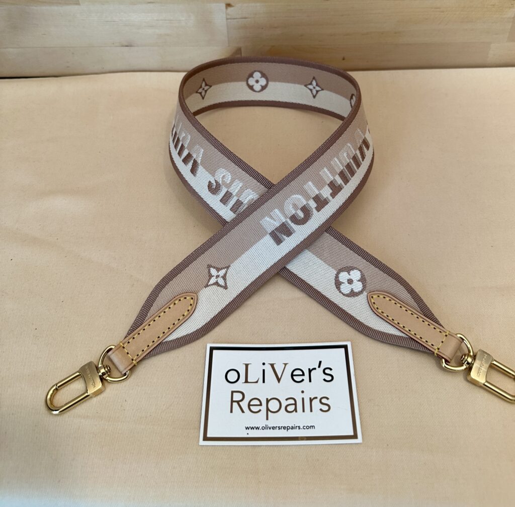 LOUIS VUITTON Bandouliere Gurt gewebt, beige Hardware gold